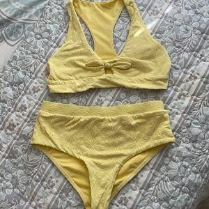 A yellow bathing suit